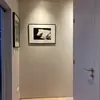 From the entrance: the corridor gives access to the living room on the left, kitchen, storage space on the right, bathroom and bedroom after the corner.